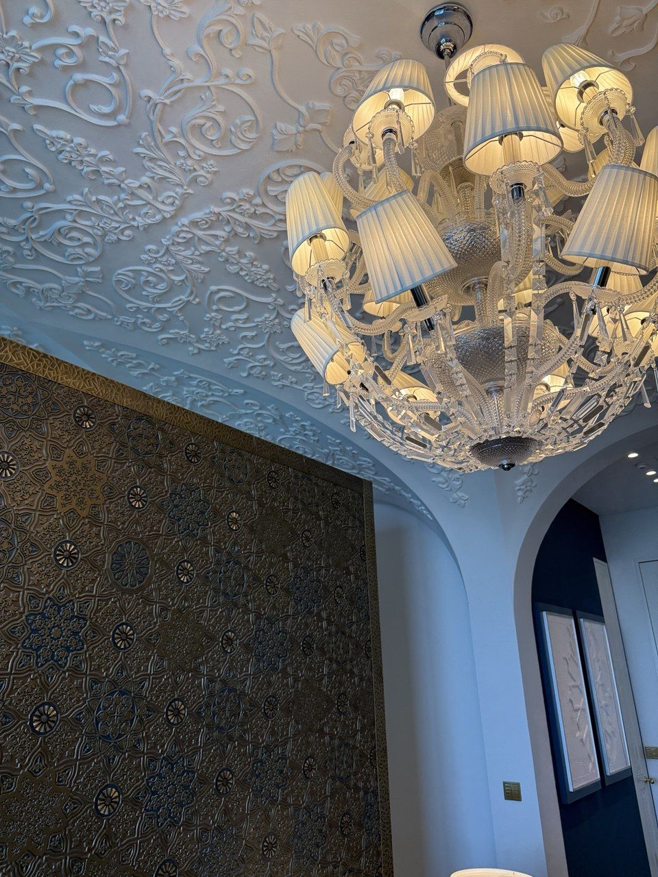 Raffles Doha chandelier interior — luxury hotel details